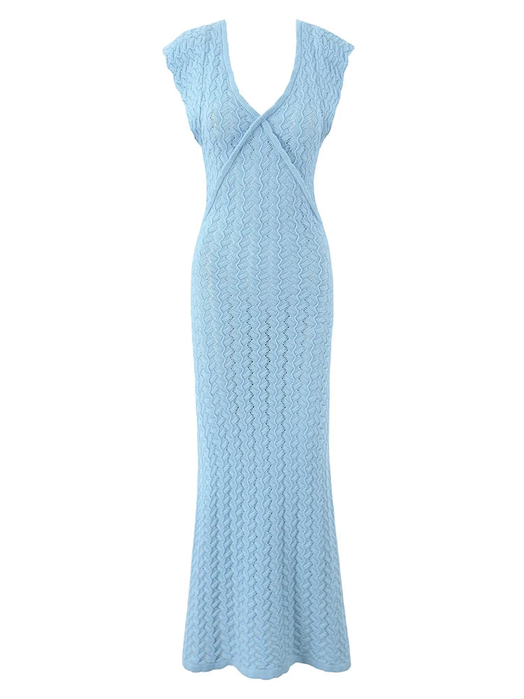 Light blue dress with a textured pattern on a white background